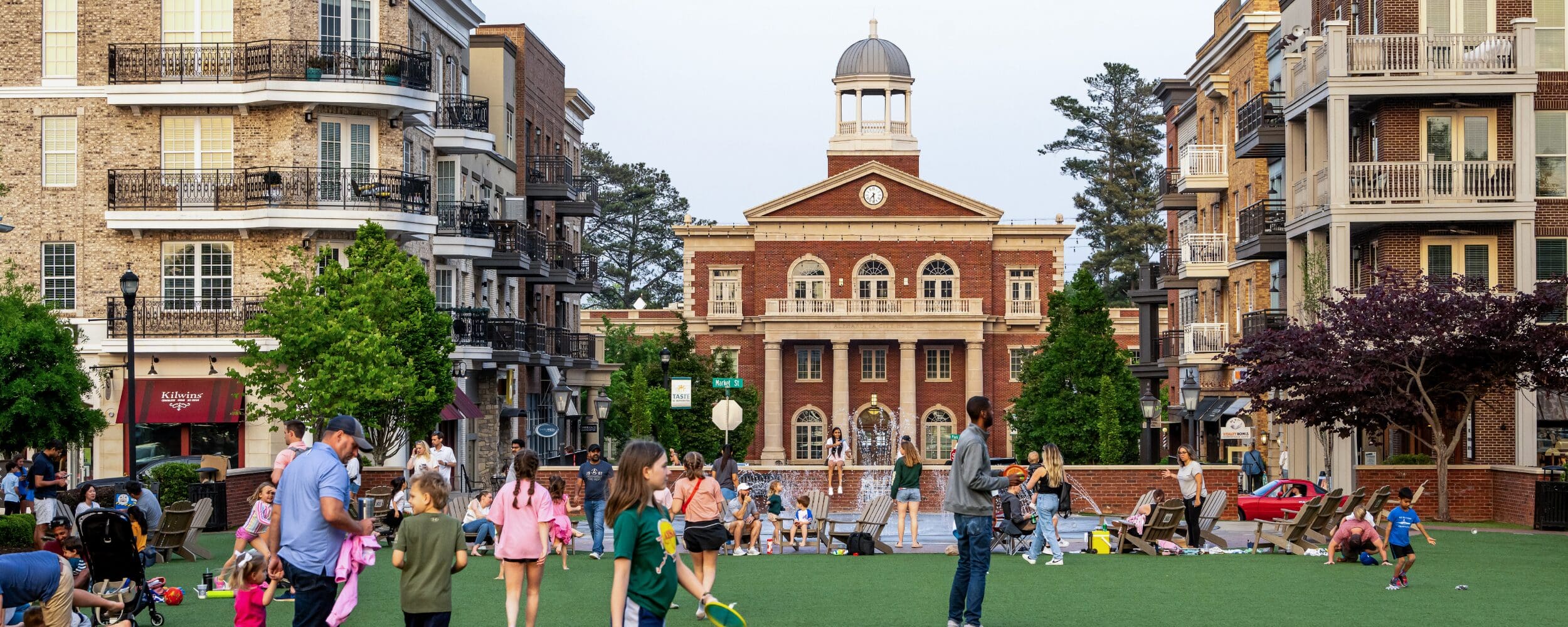 Families enjoying downtown Alpharetta Georgia — one of the best suburbs to live near Atlanta